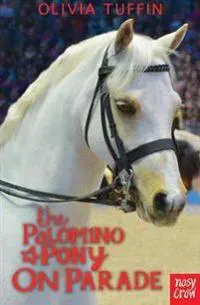 Palomino pony on parade