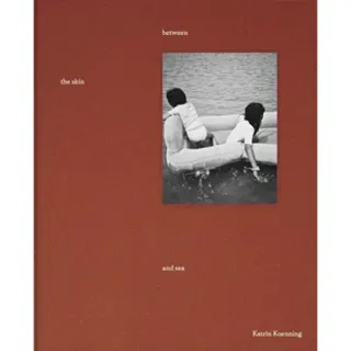 between the skin and sea